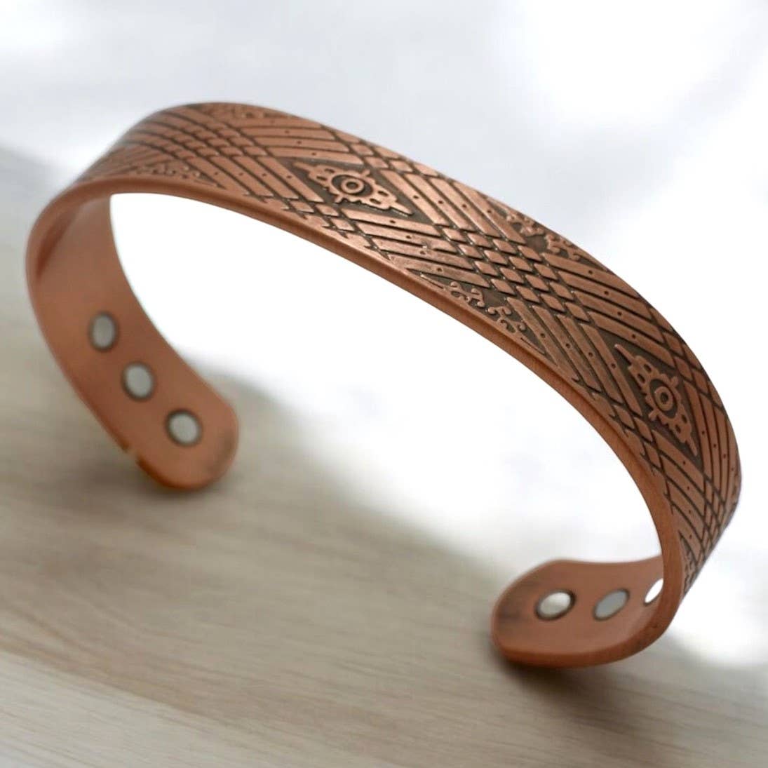 P 34  copper therapy bracelet southwest design with magnets